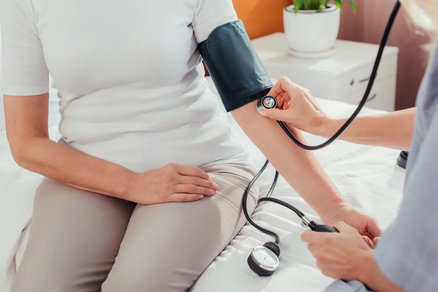 Nurse measuring a patient’s blood pressure